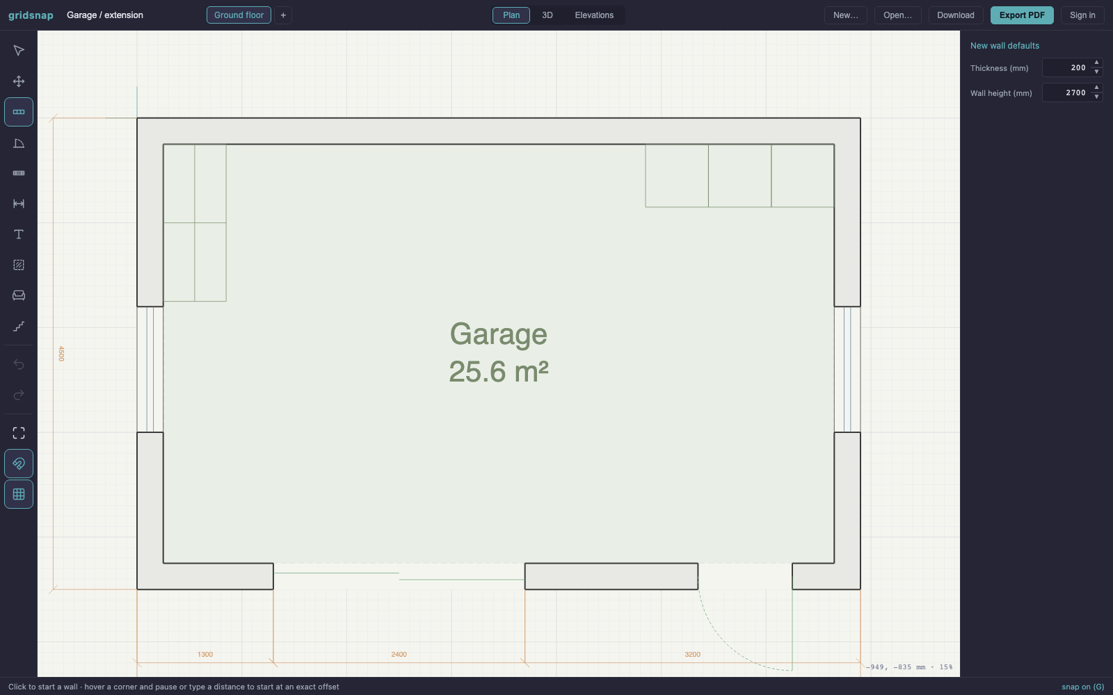 Garage floor plan, 6.9 by 4.5 metres, with vehicle door, side entrance, windows and storage cabinets, drawn with dimensions